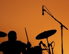 drummer playing drumkit